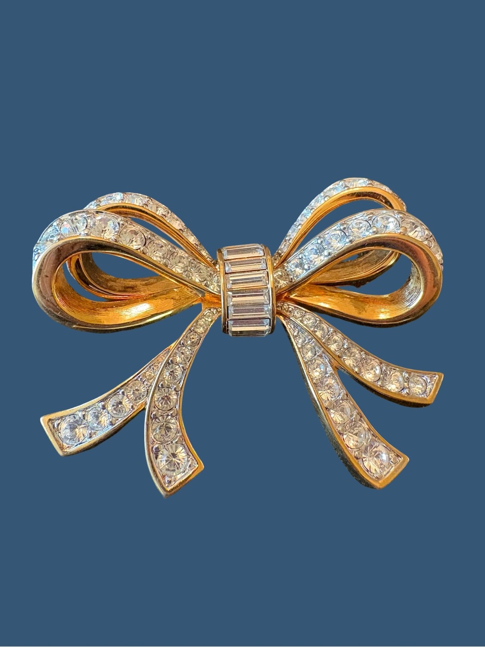 Vintage Swarovski Gold Tone Bow Brooch with Clear Crystals